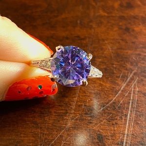 Amethyst and white sapphire ring